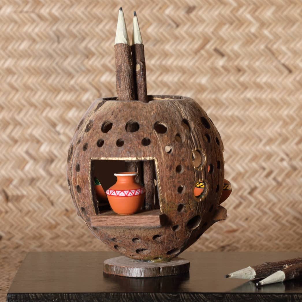 Coconut carvings Carriers:(POT)
