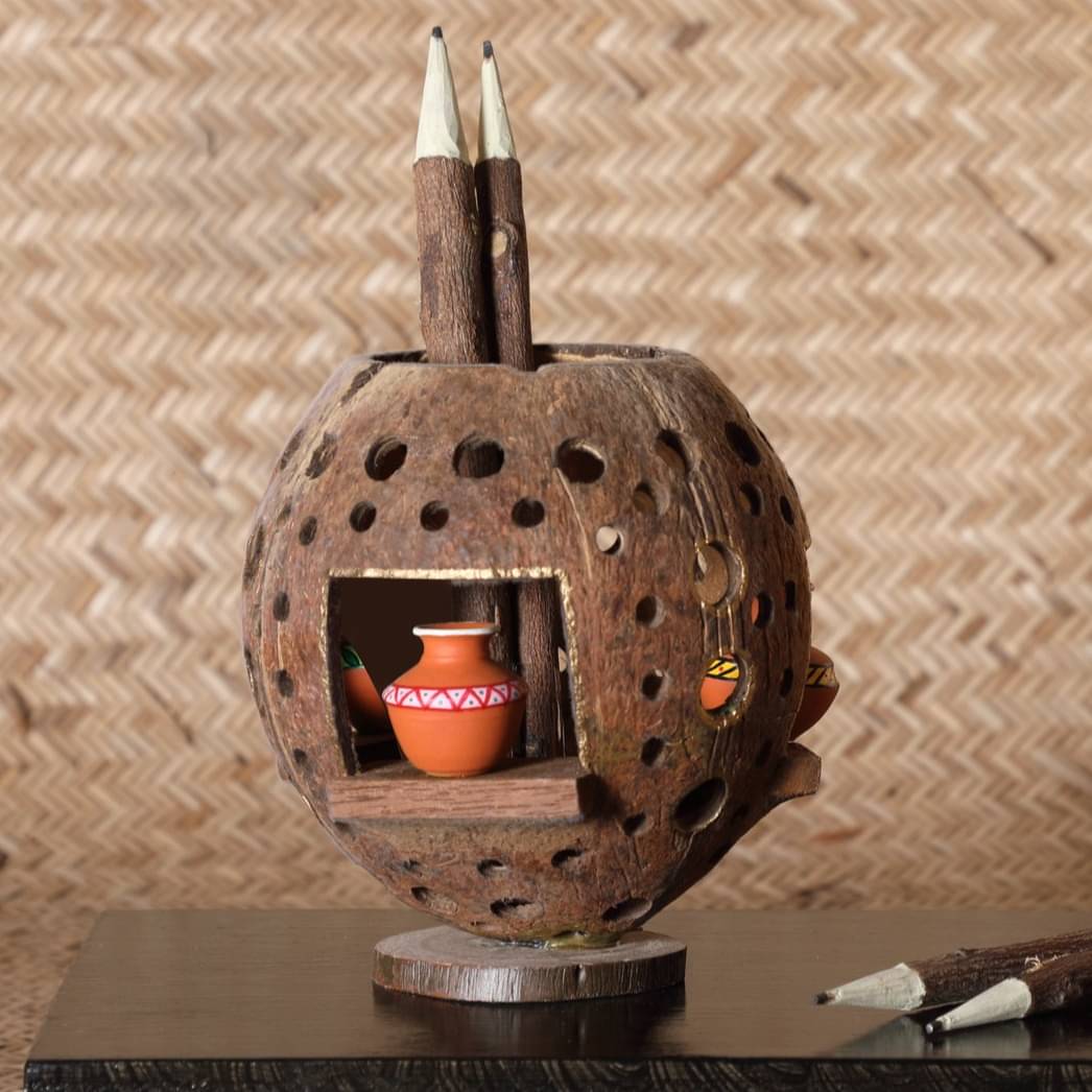 Coconut carvings Carriers:(POT)