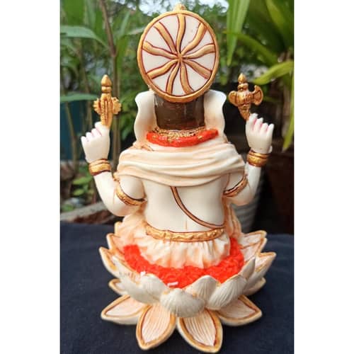 Lord Ganesha sitting on Lotus statue