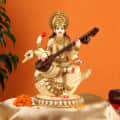 Lord Saraswati Statue Fine Gold Plating - photo