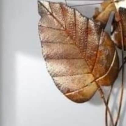 Golden leaf Metal wall Art - top_view