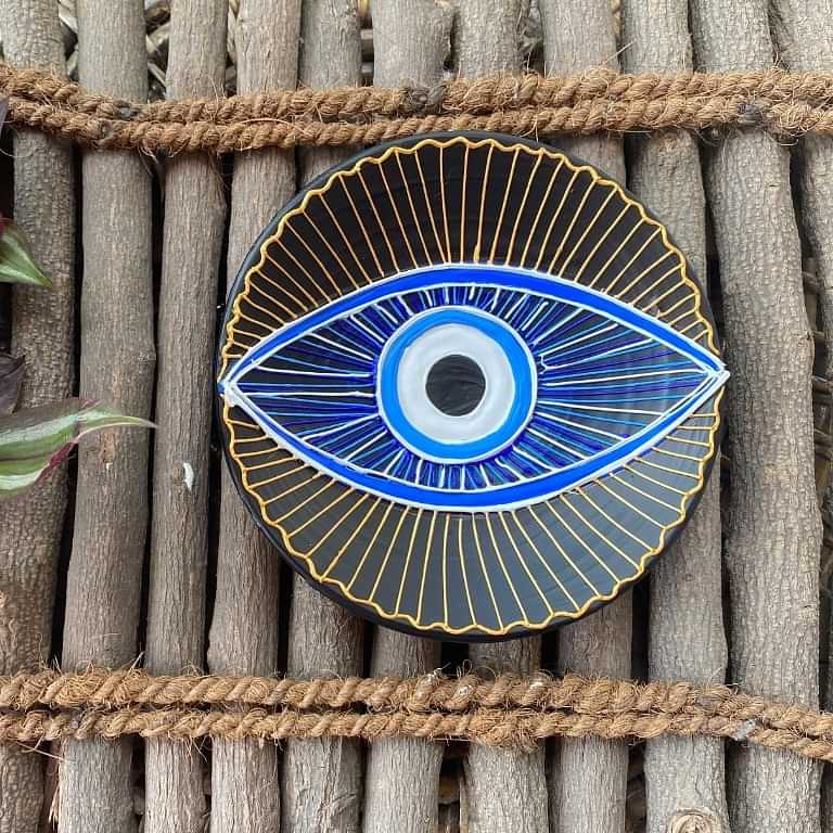 EARTHENWALLPLATES artificial wall plates with eye painting - photo