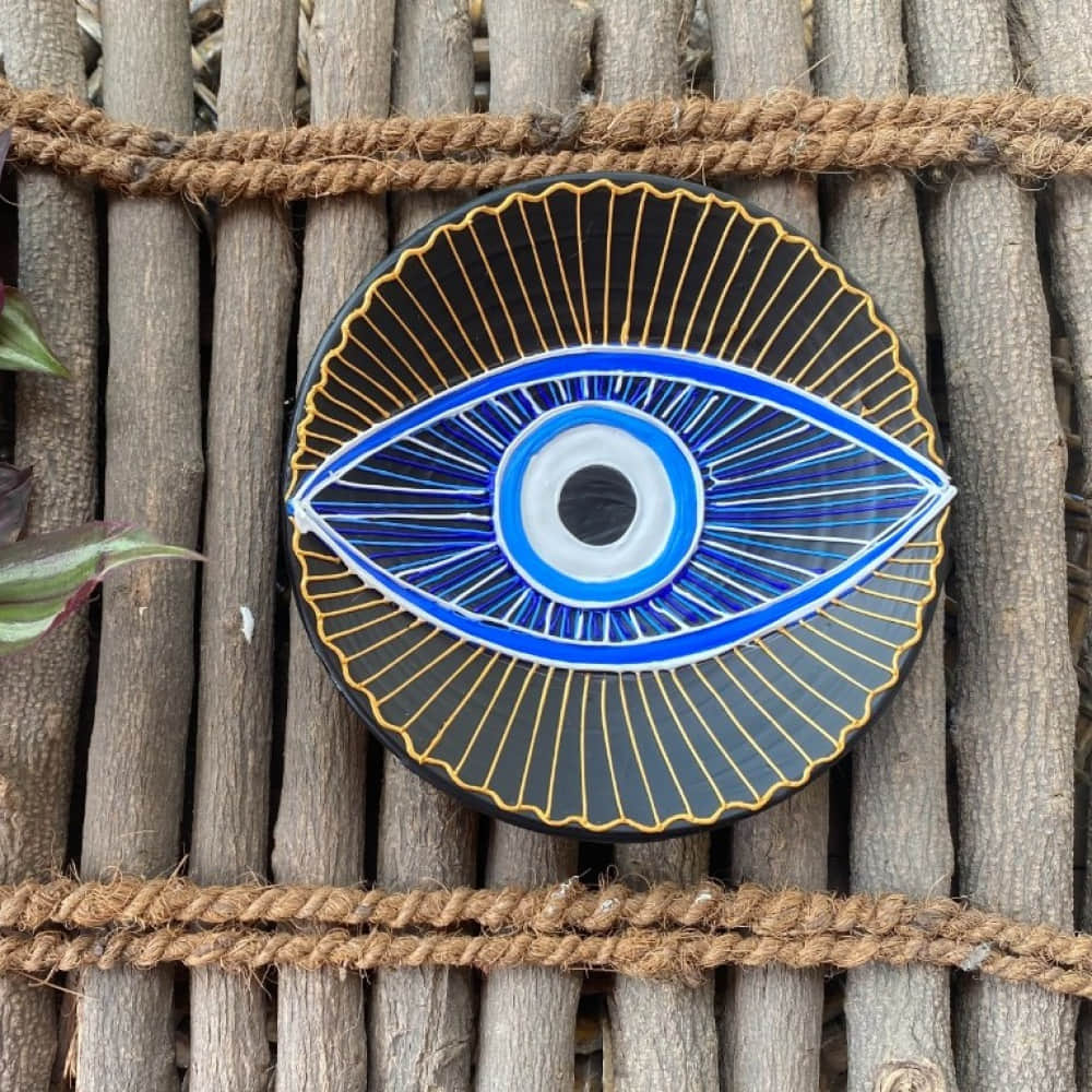 EARTHENWALLPLATES artificial wall plates with eye painting - photo