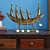 Iron Boat Traveller Figurine In Gold - photo