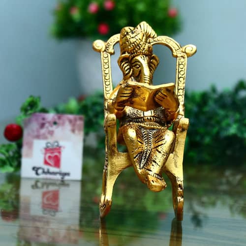 Metal Lord Ganesha Reading Ramayana Statue