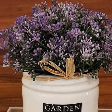 White Ceramic Small Planter with some flower