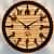 Wooden Clock With Ring Attached To Numbers - photo