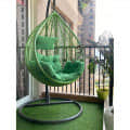 Single Seater Outdoor Swing Chair With Green Cushions - photo