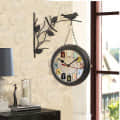 Strasbourg Round Clock With Hanging Bird - photo
