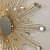 Sunburst Mirror In Golden Finish - front_view