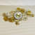Warsaw Golden Wall Clock Metal Wall Art - front_view